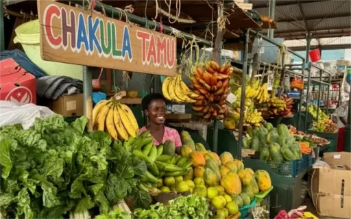an image of a kenyan market with vegetables